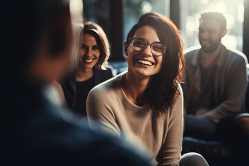 Professional therapist conducting a candid group session, showing genuine compassion and a comforting smile, emphasizing the importance of mental health and counseling - obrazy, fototapety, plakaty