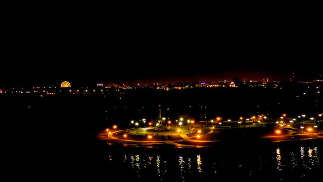 Yaroslavl, Russia. Strelka (Spit), Kotorosl flows into the Volga River. City lights at night, Aerial View