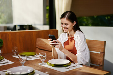 Woman restaurant cafe person lifestyle business mobile female smartphone happy young