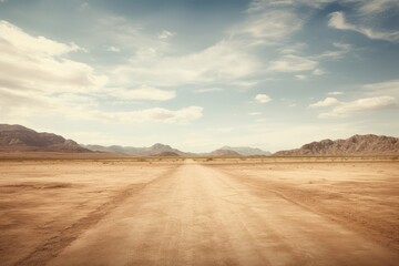 Fototapeta na wymiar Empty road adventure in a dry desert environment