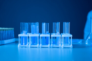 tray with glass test tubes on the table in the laboratory