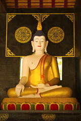 Thai Buddha Statue with light in hand Lanna style