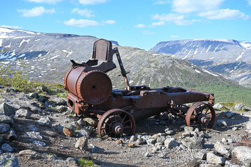 Old American abandoned steam machine in the Khibiny mountains. Russia