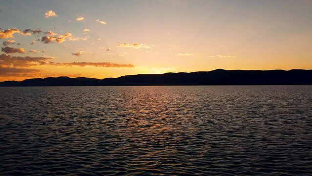 Bear Lake Utah Summer Beautiful Sunrise over the Moutains and Water 