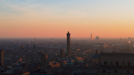 historical sites of bologna with sunrise light in december skyline aerial view two towers maggiore square san petrino basilica