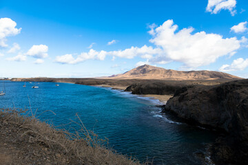 Panoramic view of the rocky coastline of Papagago on Lanzarote in a volcanic landscape in Los Ajaches National Park. Playa Blanca, Lanzarote, Spain
