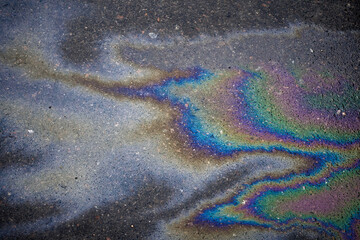 Oil stain, Gas Stain drop from the Car on the Parking Lot Floor