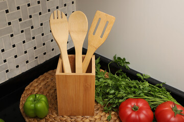 Wooden Bamboo Utensil Holder, bamboo kitchen utensils, Bamboo Utensil Holder, Garden Salad, Bamboo Salad Set, close-up and concept shot. e-commerce photos, free space for writing,