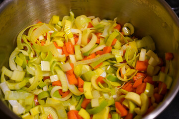 Fresh healthy vegetables  cooking in a metal pan