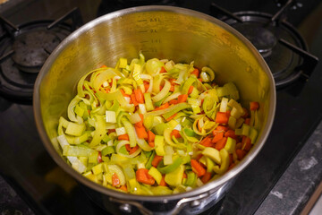 Fresh healthy vegetables  cooking in a metal pan