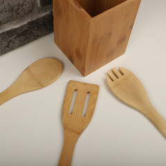 Wooden Bamboo Utensil Holder, bamboo kitchen utensils, Bamboo Utensil Holder, Garden Salad, Bamboo Salad Set, close-up and concept shot. e-commerce photos, free space for writing,