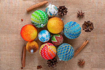 Exquisite handmade Christmas bubble toy from beads, also known as a Christmas globe or Christmas bulb, is a part of holiday decor.