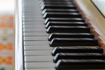 Looking along a piano keyboard, with selective focus