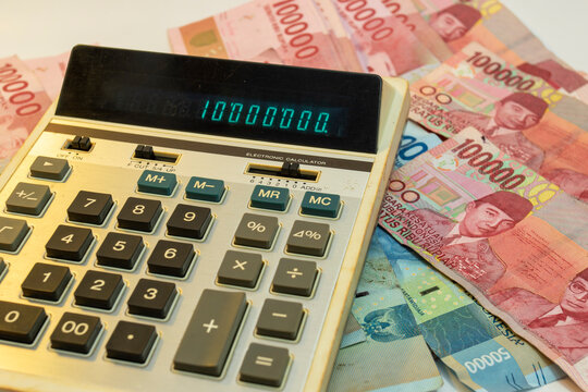 Calculator On Indonesian rupiah cash banknotes money