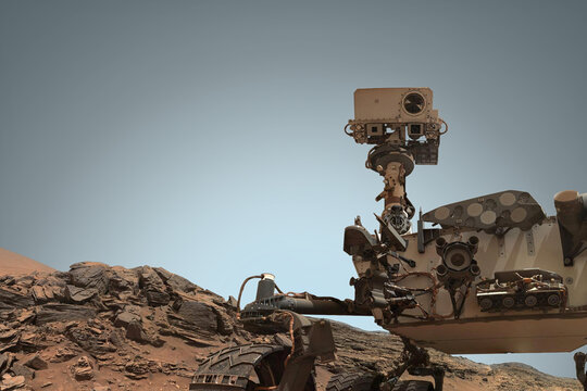 Curiosity Mars Rover exploring the surface of red planet. Elemen - Powered by Adobe