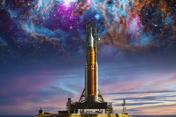 Orion spacecraft on launchpad on nebula background. Mission to the Moon. Artemis space program to research solar system. Elements of this image furnished by NASA.