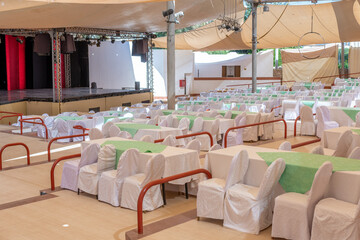 Rows of chairs and stage in concert hall in Egypt hotel.