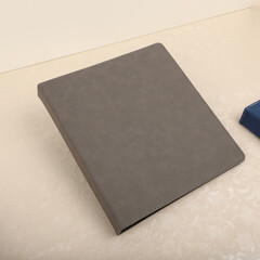 Personalized binding, leather folder cover, leather binding, binder, binder, office binding, corporate gift. Concept shot leather binding, top view, colorful