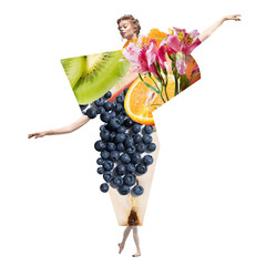 Beautiful young woman, ballerina dressed in organic dress made of different fruits and flowers over white background. Contemporary art collage. Concept of food, creativity, inspiration, organic food