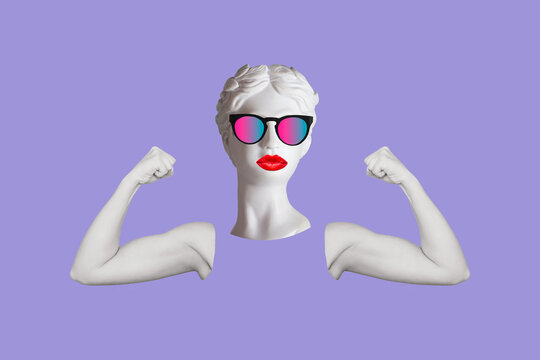 Strong woman headed by antique statue in colorful sunglasses raises arms showing biceps on a purple color background. Support women rights, feminism. Trendy collage in magazine style. Contemporary art