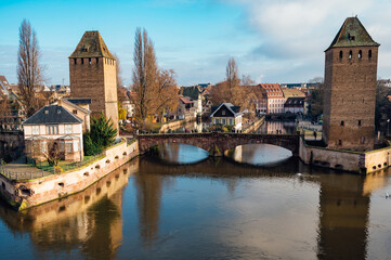 Fototapeta na wymiar Winter panorama of the famous bridges Ponts Couverts in Strasbourg, France. 