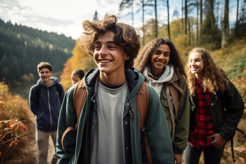 Diverse group of teenagers hiking and enjoying nature, a group of friends exploring the great outdoors, embracing an active lifestyle while bonding and creating lifelong memories