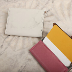 Colored leather business card holder, Genuine leather business card holder, concept shot, top view, different color, clamshell and stitched card holder