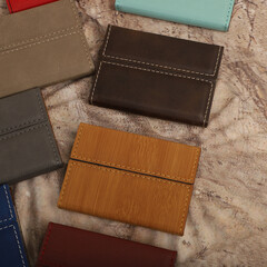 Colored leather business card holder, Genuine leather business card holder, concept shot, top view, different color, clamshell and stitched card holder