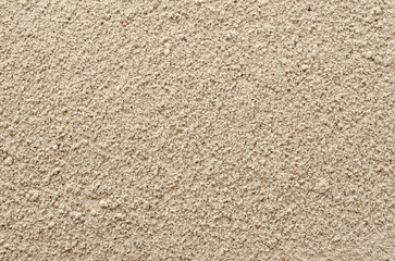 Pile of gray cement powder as a background, texture, top view. Gray cement powder, background,...