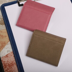 Colored leather business card holder, Genuine leather business card holder, concept shot, top view, different color, clamshell and stitched card holder