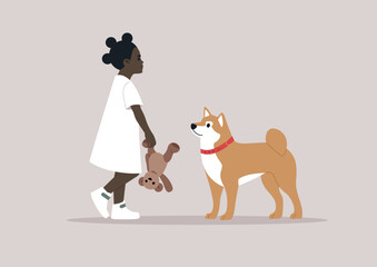 A preschool girl sharing quality time with her shiba inu puppy by offering her teddy bear