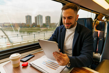 Man has a business meeting via video call using tablet on his commute to work - Powered by Adobe