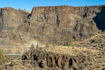 Patterns in the basalt cliffs above the Crooked River at Cove Palisades State Park, Oregon, USA