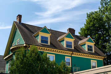 Gabled dormer windows on a beautiful traditional style house on a summer day in Brookline, MA, USA - obrazy, fototapety, plakaty