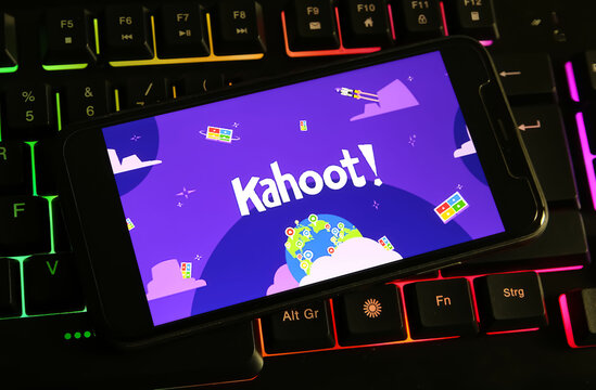 Viersen, Germany - December 9. 2023: Closeup of smartphone on computer keyboard with logo lettering of Kahoot! learning platform