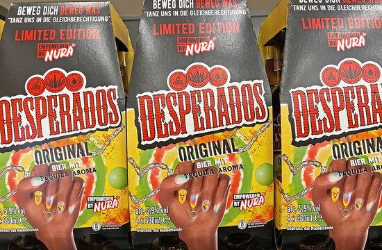 Viersen, Germany - December 9. 2023: Closeup of packs Desperados mexican tequila flovored beer in store shelf