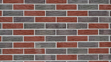 smoothed brick texture in red and gray tones with a decorative pattern on the blocks as an empty...