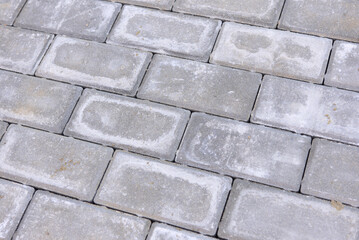 White salt appeared on the paving slabs