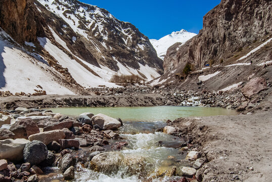Snowy mountains, mountain river. Elbrus region, Caucasus