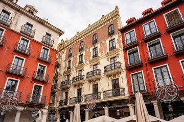 Fototapeta premium Picturesque buildings with colorful facades in the main square of Valladolid, Spain.
