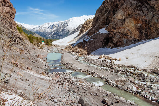Snowy mountains, mountain river. Elbrus region, Caucasus