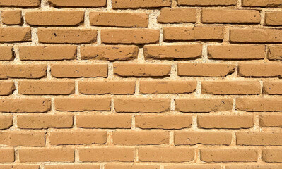 terracotta colored brick wall