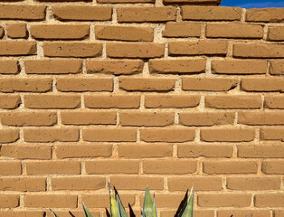 terracotta colored brick wall