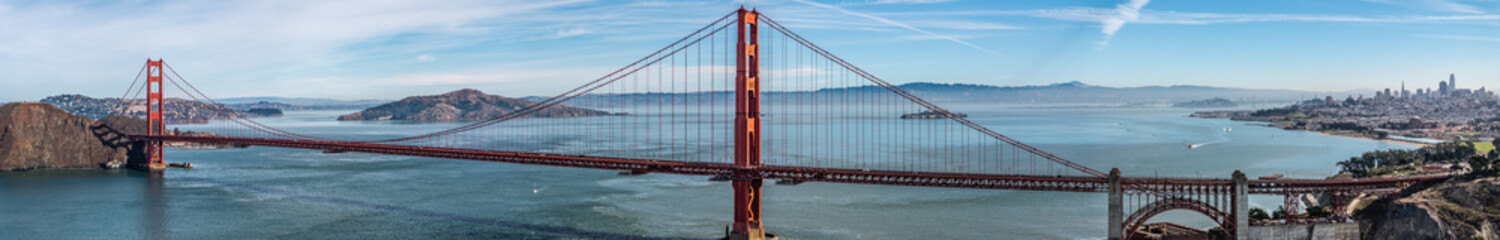 panoramic aerial landscape view of San Francisco Bay Area with Golden Gate Bridge in front and San Francisco downtown in right upper corner.  - obrazy, fototapety, plakaty