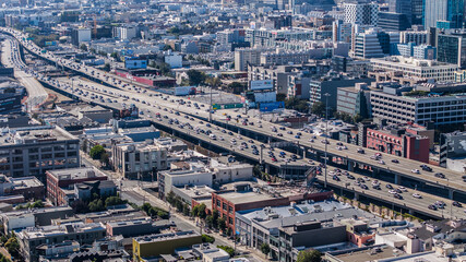 aerial cityscape view of Rincon Hill District in San Francisco with massive traffic on Interstate...