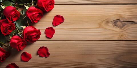 Red roses on a wooden background with a heartshaped envelope. Valentines day advertisement concept. Space for text