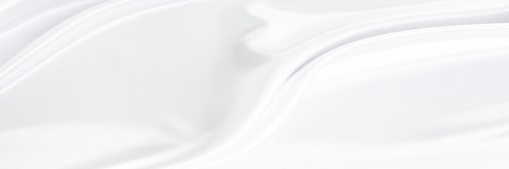 White gray satin texture that is white silver fabric silk background with beautiful soft blur pattern natural.