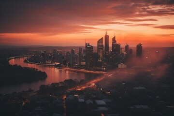 Fototapeta premium Drone Shot Of City Bathed In Peachyorange Light For Aerial Cityscape