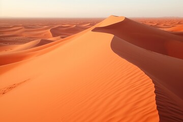 Fototapeta na wymiar Aerial View Of Peachy-Orange Sands In Desert Dunes