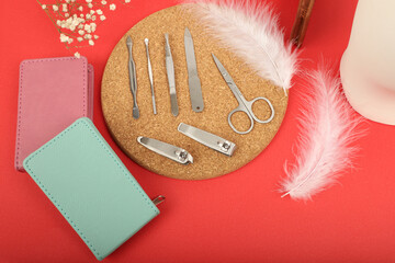 Manicure set kit in Colorful leather case. Concept shot, top view, different colors Manicure set....